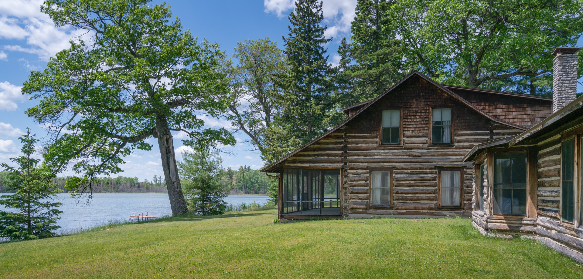 5021 Solomon Road Atlanta, MI 49709 - Photo 21 of 34 a view of a house with a yard