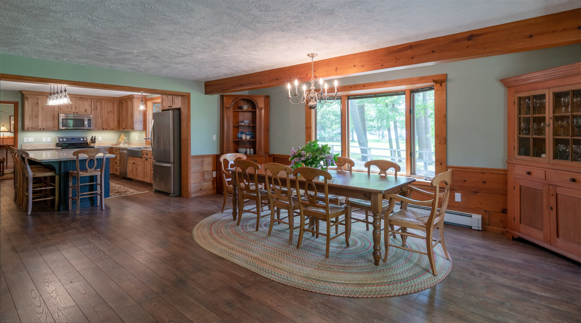 5021 Solomon Road Atlanta, MI 49709 - Photo 6 of 34 a dining room with furniture window and wooden floor