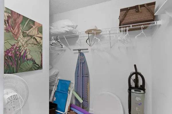 a view of small space with racks on the wall