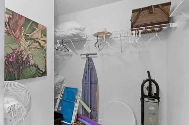 a view of small space with racks on the wall