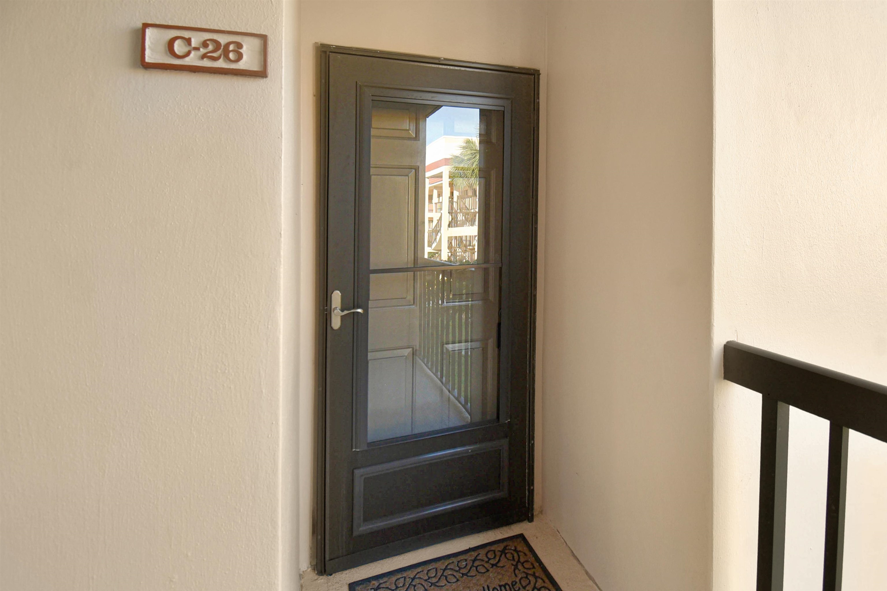 4250 A1A South, Unit C26 St. Augustine, FL 32080 - Photo 2 of 39 a bathroom with a glass shower door