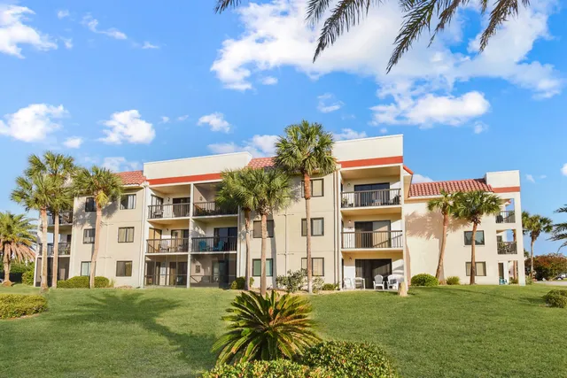 a view of building with yard