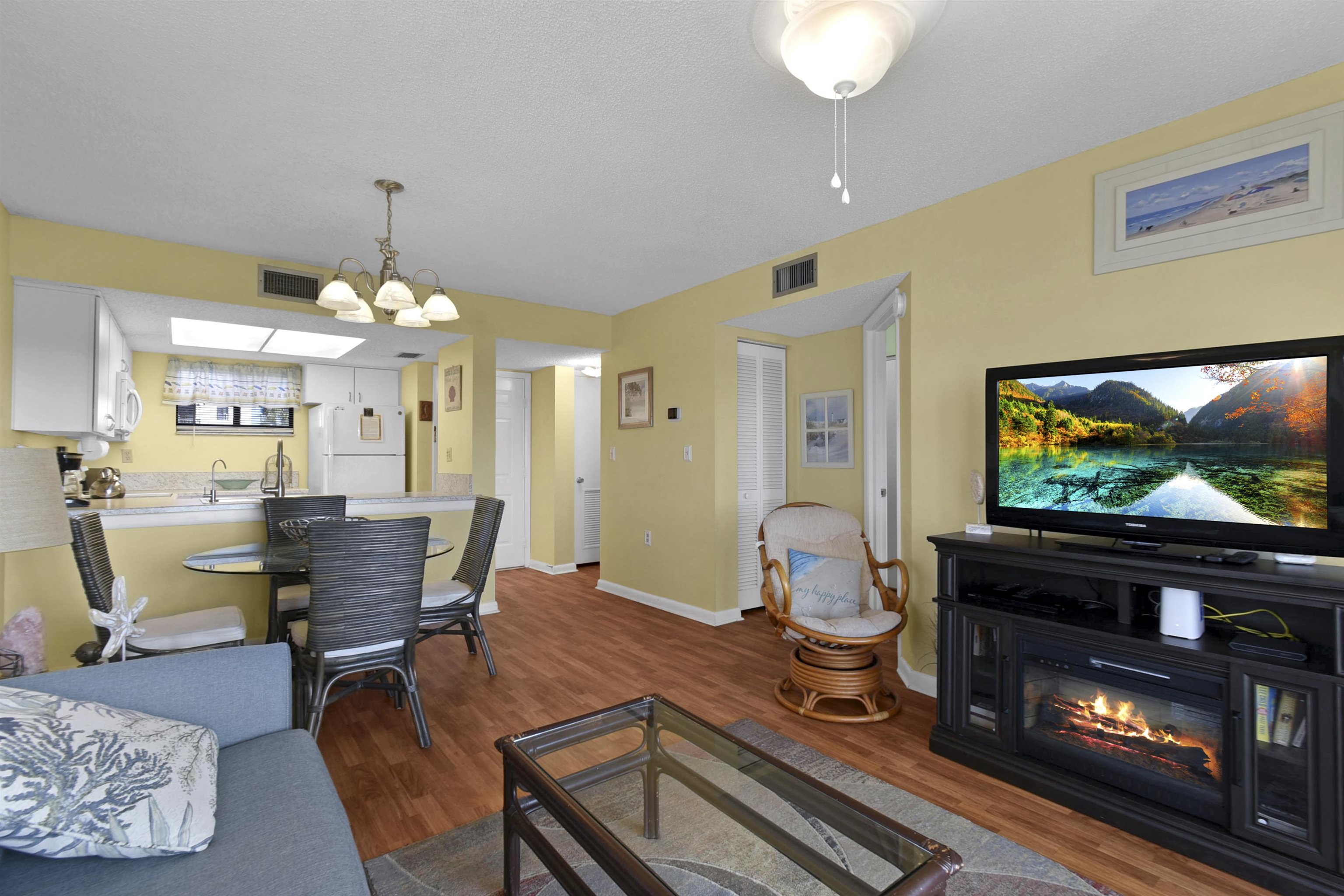 4250 A1A South, Unit C26 St. Augustine, FL 32080 - Photo 6 of 39 a living room with furniture and a flat screen tv