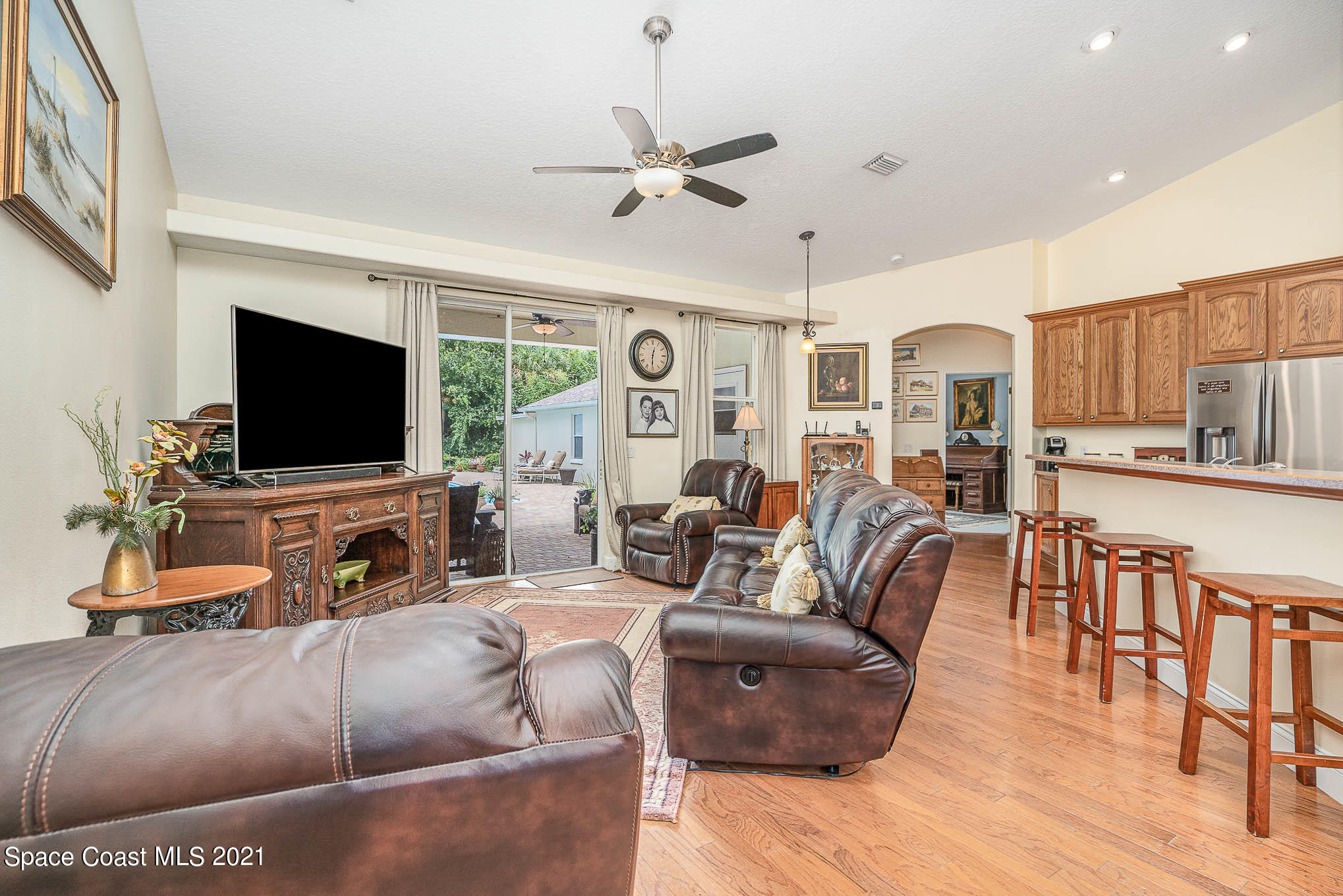 5080 Craig Road Cocoa, FL 32926 - Photo 13 of 41 a living room with furniture and a flat screen tv