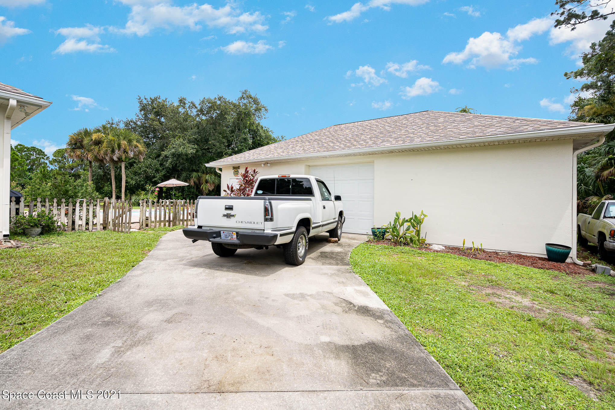 5080 Craig Road Cocoa, FL 32926 - Photo 26 of 41 a view of a house with a back yard