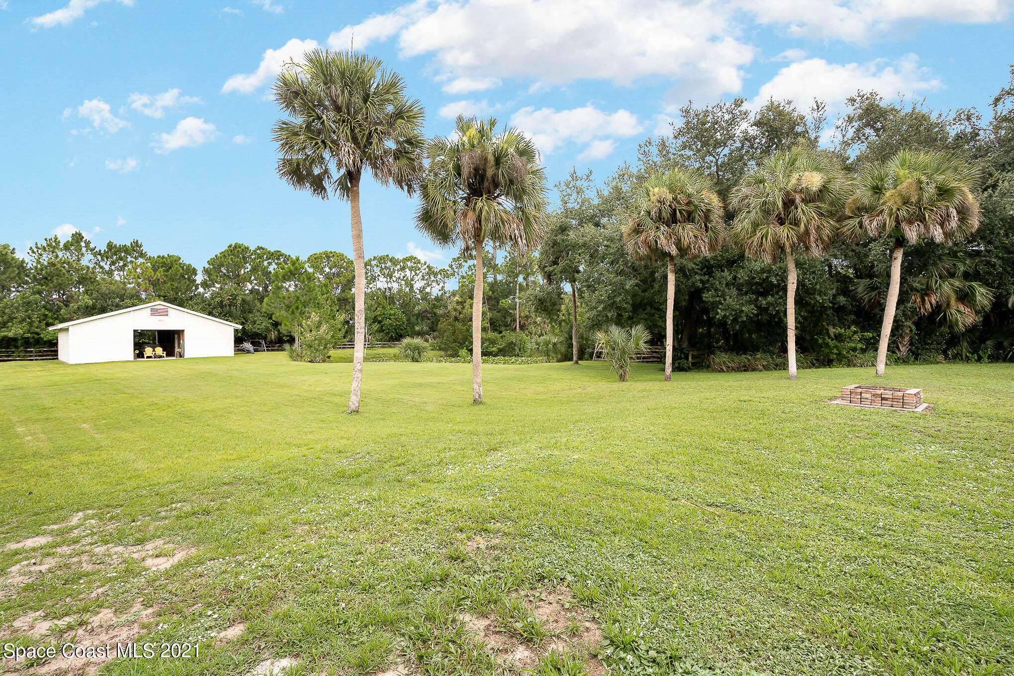 5080 Craig Road Cocoa, FL 32926 - Photo 36 of 41 a view of a house with a yard