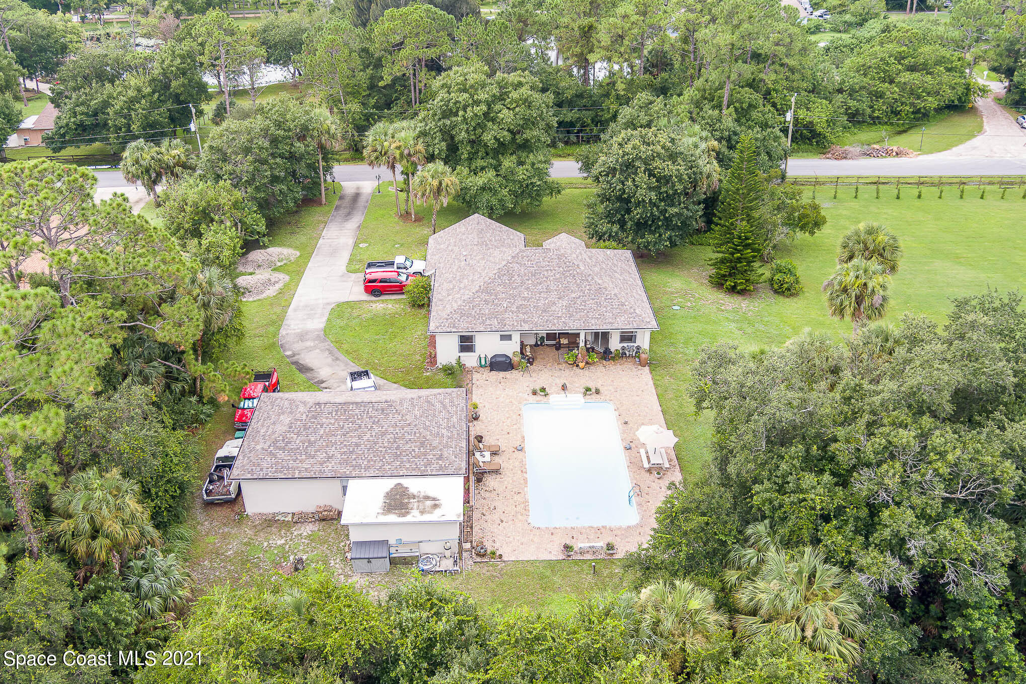 5080 Craig Road Cocoa, FL 32926 - Photo 41 of 41 an aerial view of a house with outdoor space and street view