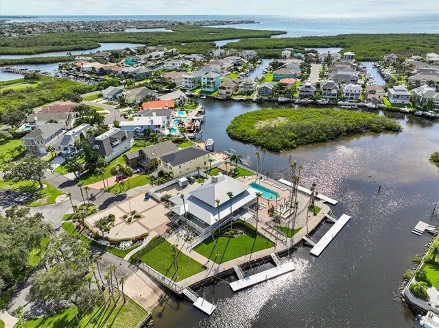 an aerial view of a pool patio and outdoor seating