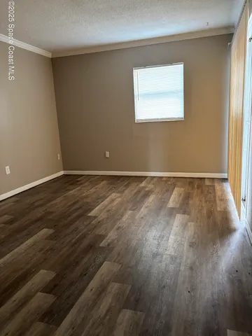 a kitchen with cabinets and appliances