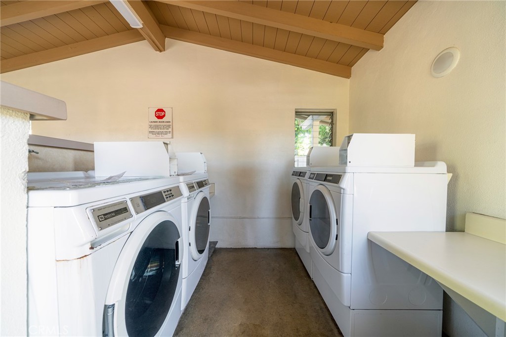 43 Calle Aragon, Unit C Laguna Woods, CA 92637 - Photo 27 of 41 a utility room with dryer and washer