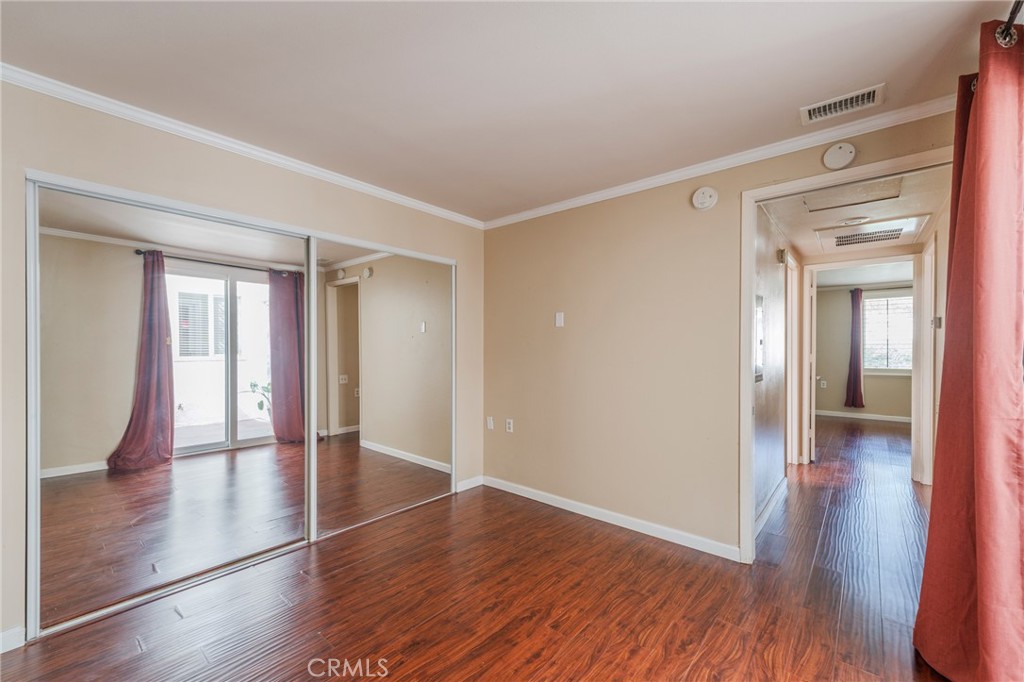 43 Calle Aragon, Unit C Laguna Woods, CA 92637 - Photo 10 of 41 wooden floor in an empty room