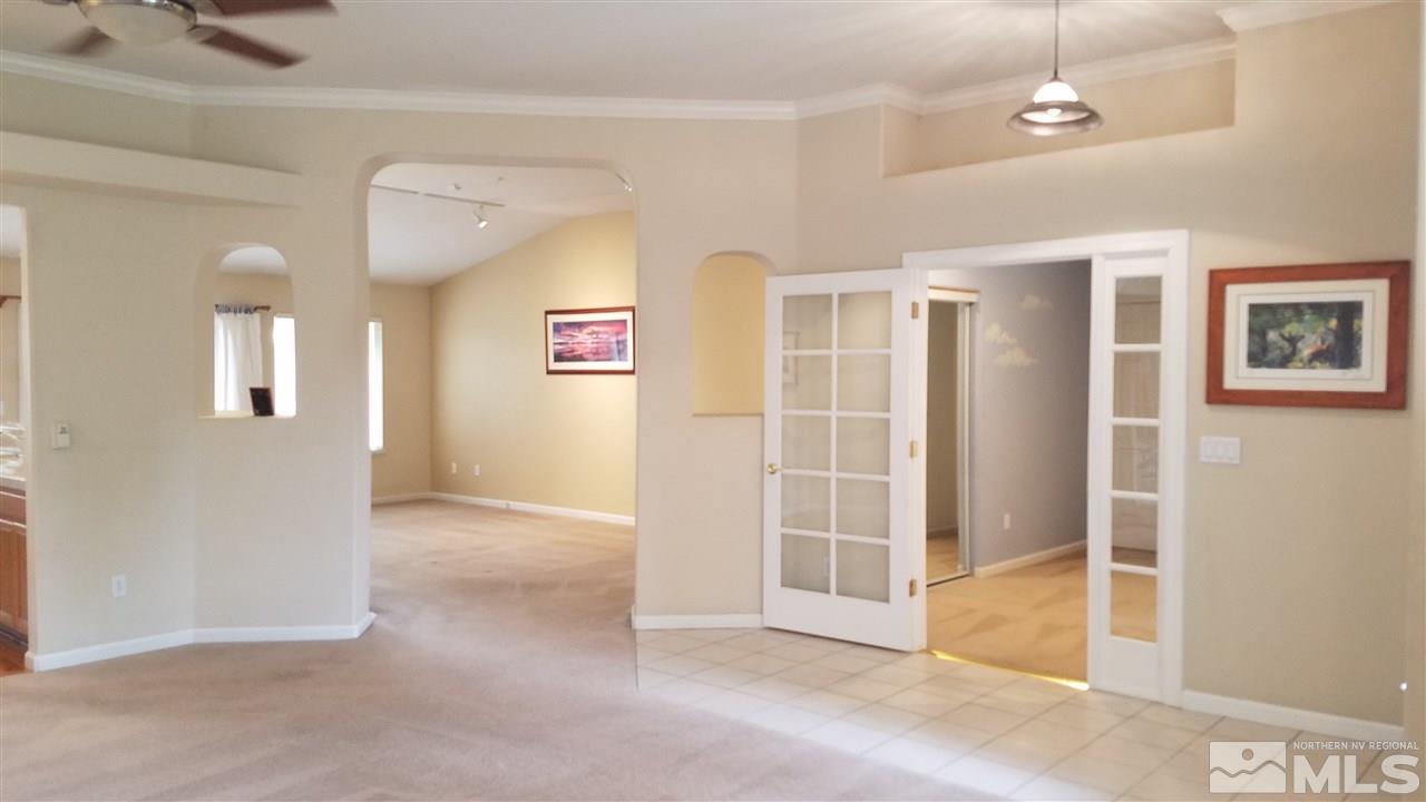 706 Putnam Court Reno, NV 89503 - Photo 3 of 20 wooden floor and ceiling fan in a room