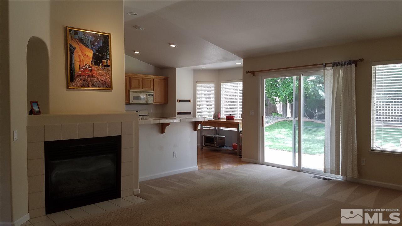 706 Putnam Court Reno, NV 89503 - Photo 9 of 20 a living room with furniture and a fireplace