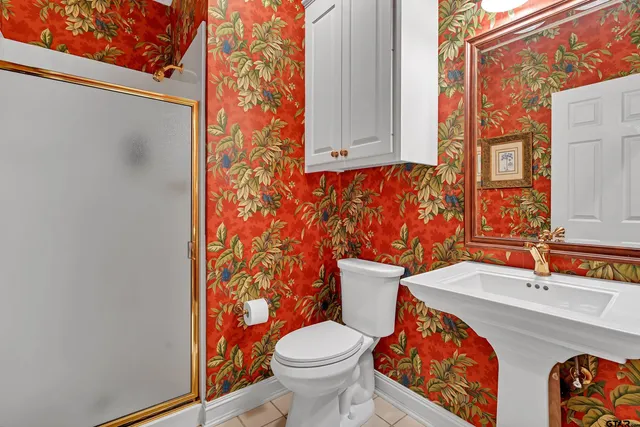 a bathroom with a sink and a toilet