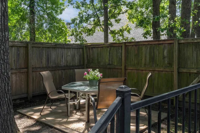 a garden with flowers and trees