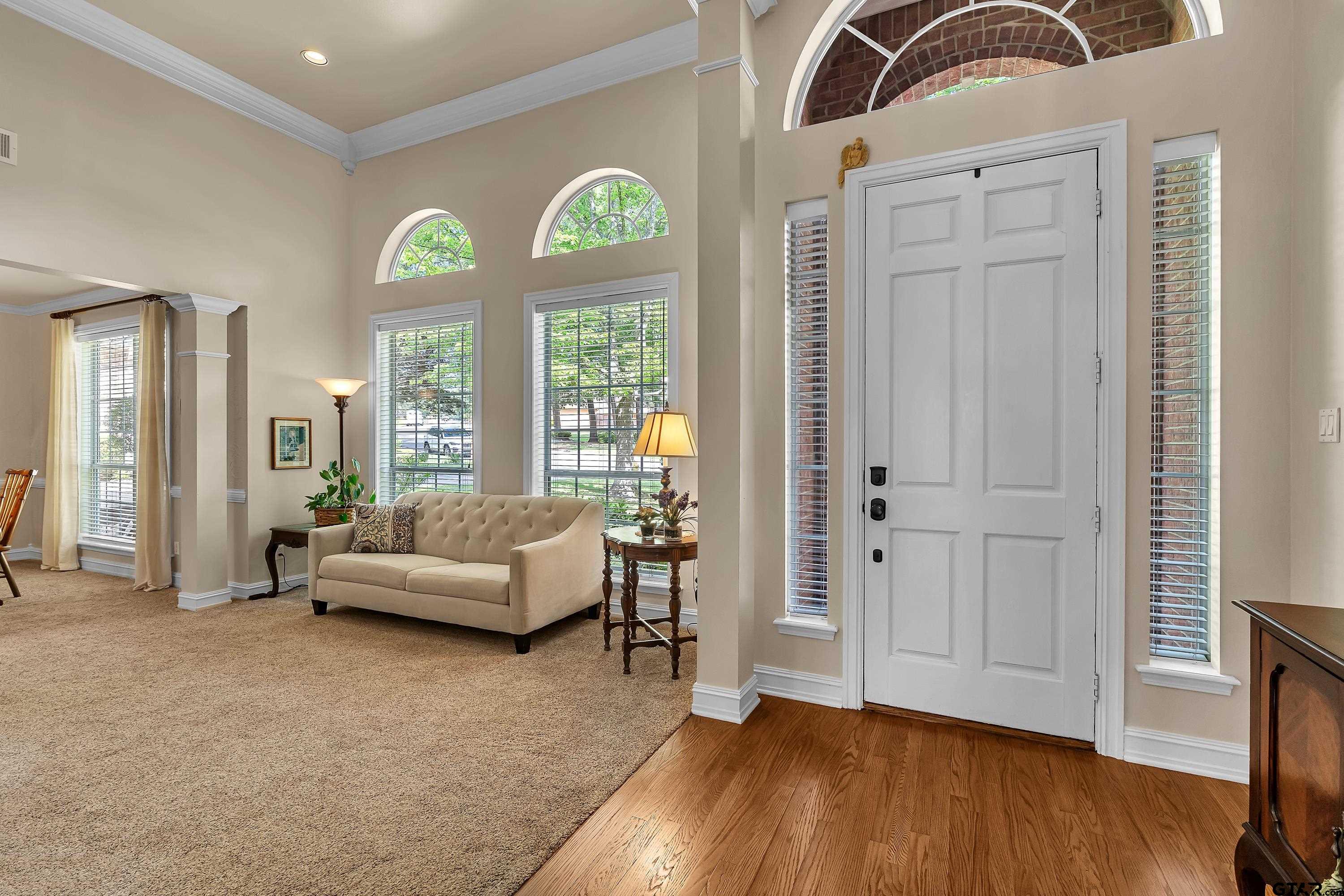 1014 Lovers Lane Longview, TX 75604 - Photo 5 of 45 a living room with furniture and wooden floor