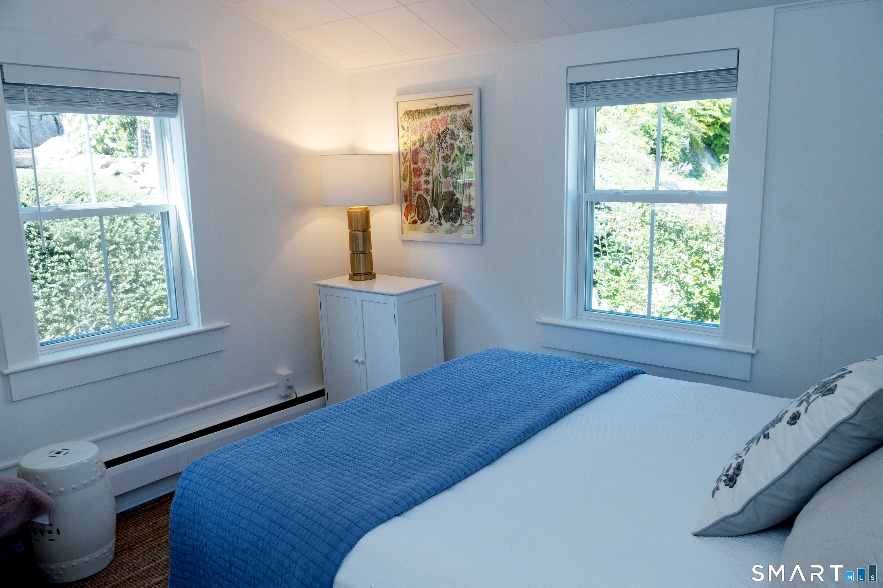 19 Pearl Street Groton, CT 06355 - Photo 13 of 39 a bedroom with a bed and a window