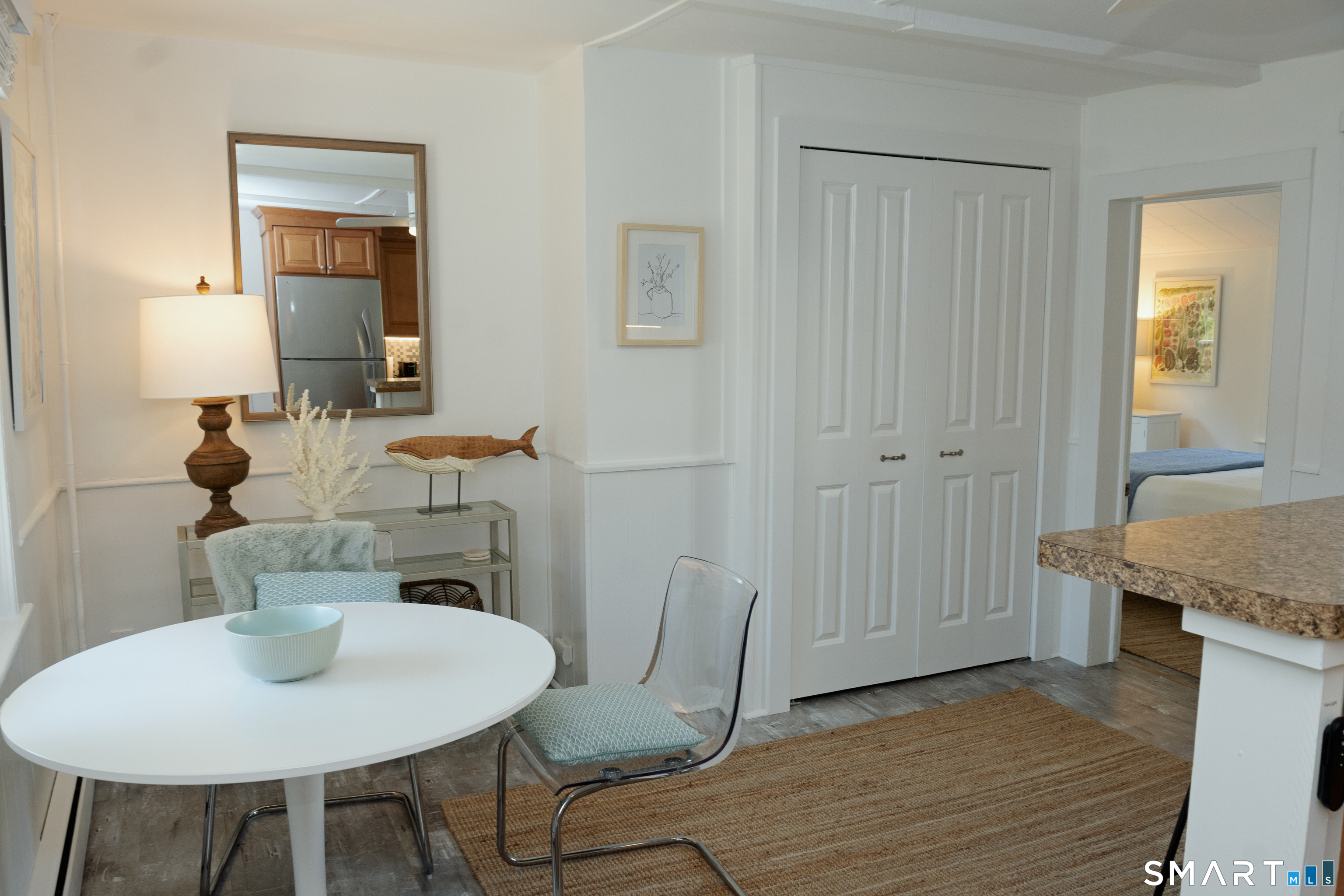 19 Pearl Street Groton, CT 06355 - Photo 19 of 39 a view of a dining room with furniture and wooden floor