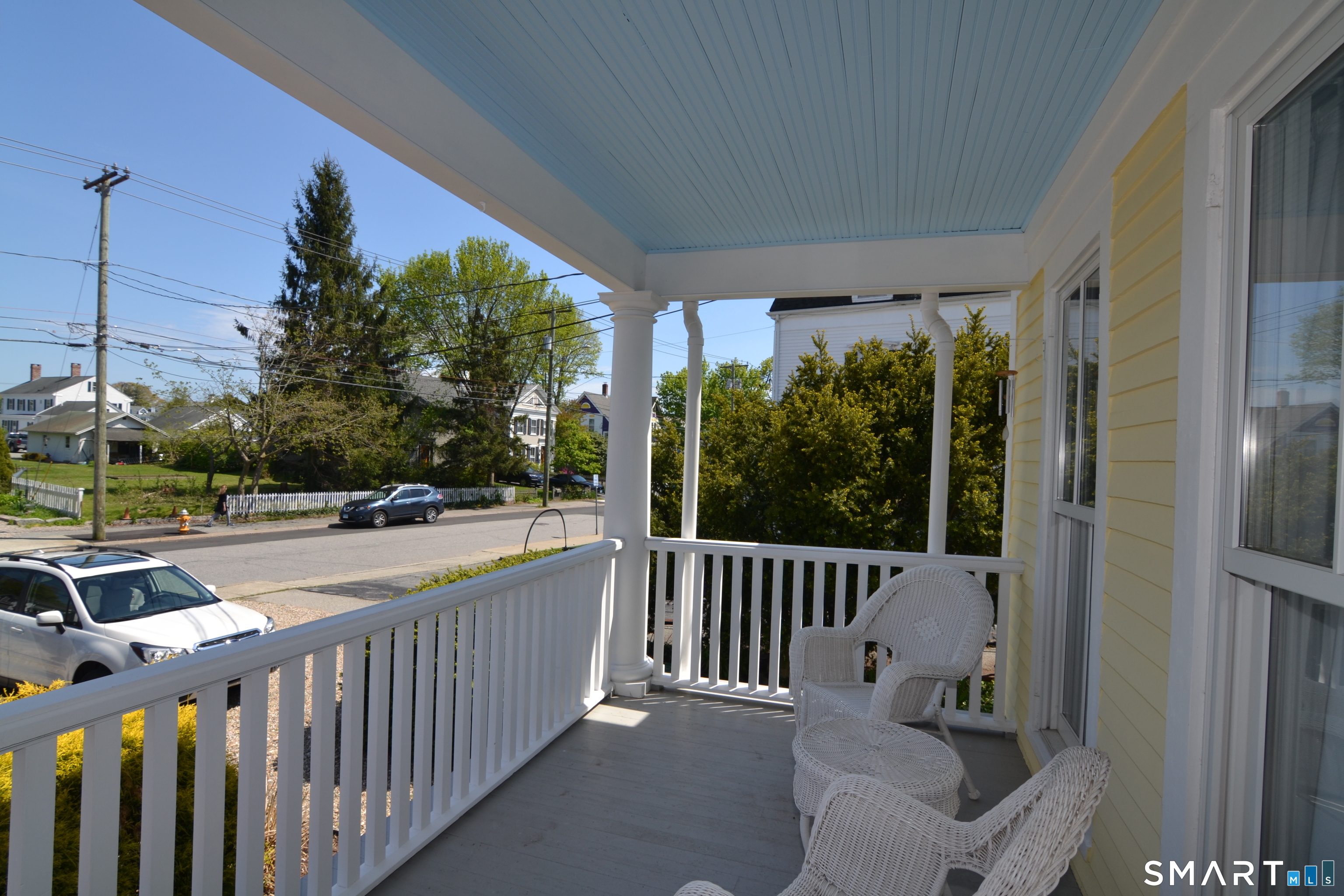 19 Pearl Street Groton, CT 06355 - Photo 28 of 39 a view of balcony with wooden floor and outdoor seating