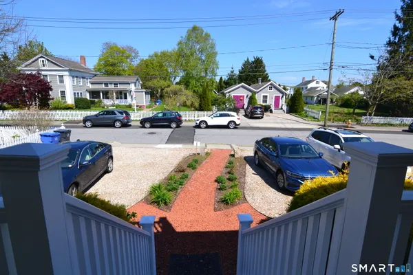 a view of outdoor space with seating area and washing machine