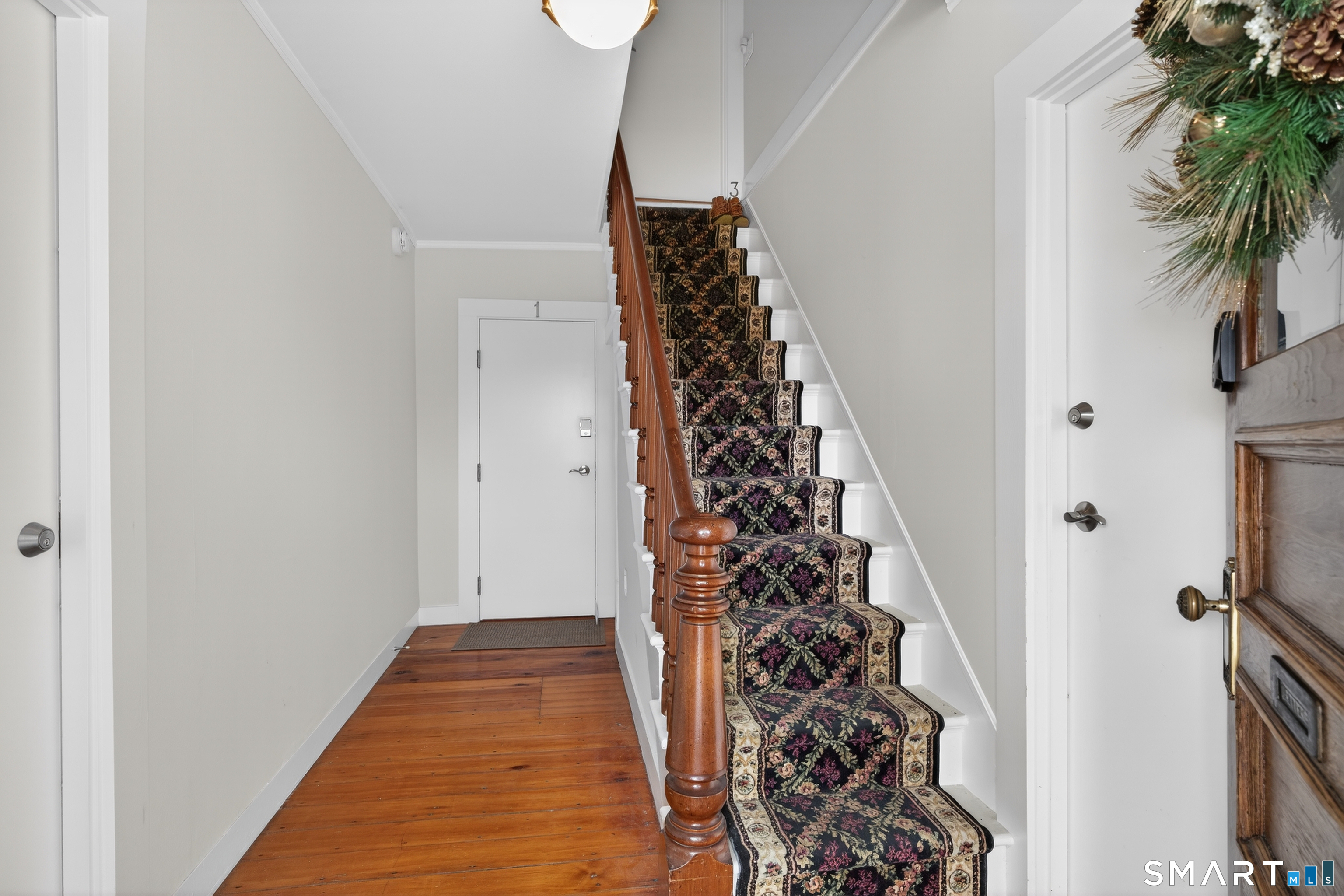 19 Pearl Street Groton, CT 06355 - Photo 6 of 39 a view of a room with a potted plant