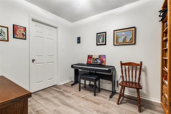 a view of a workspace with furniture