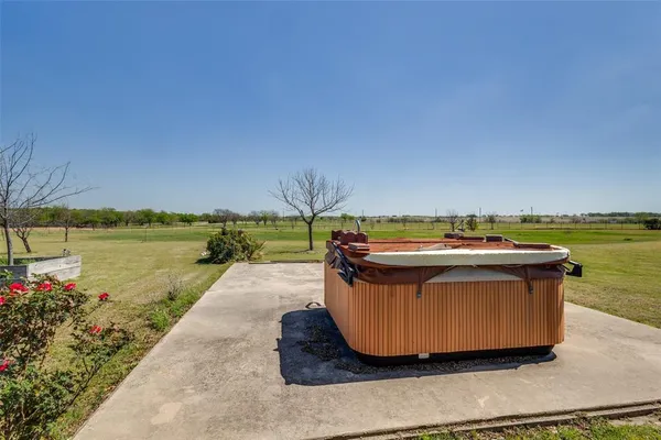 a view of a swimming pool with a lake view