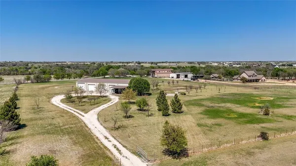 a view of a lake with big yard
