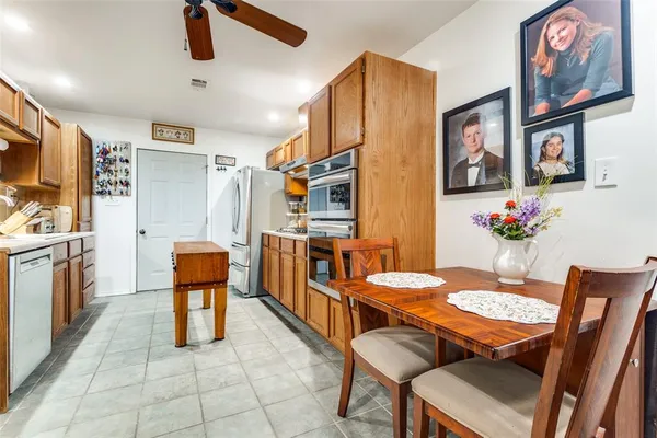 a view of a dining room with furniture