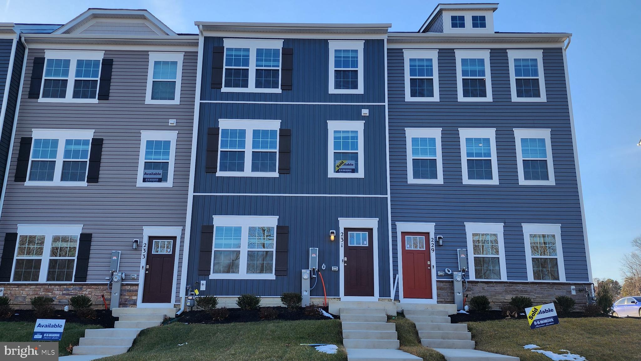 231 Joppa Farm Road Joppa, MD 21085 - Photo 2 of 25 front view of a brick house with a yard