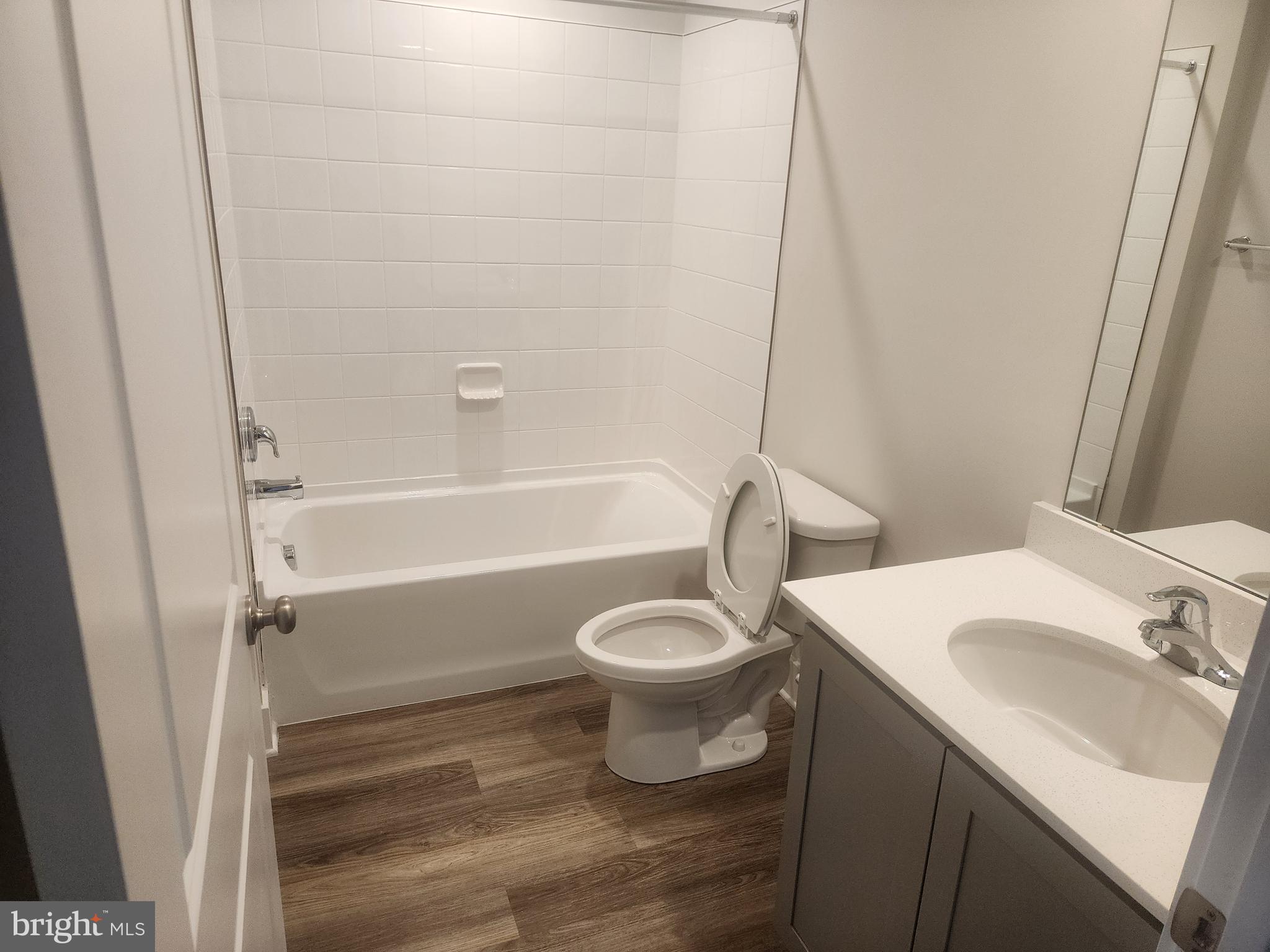 231 Joppa Farm Road Joppa, MD 21085 - Photo 5 of 25 a bathroom with a sink toilet and shower