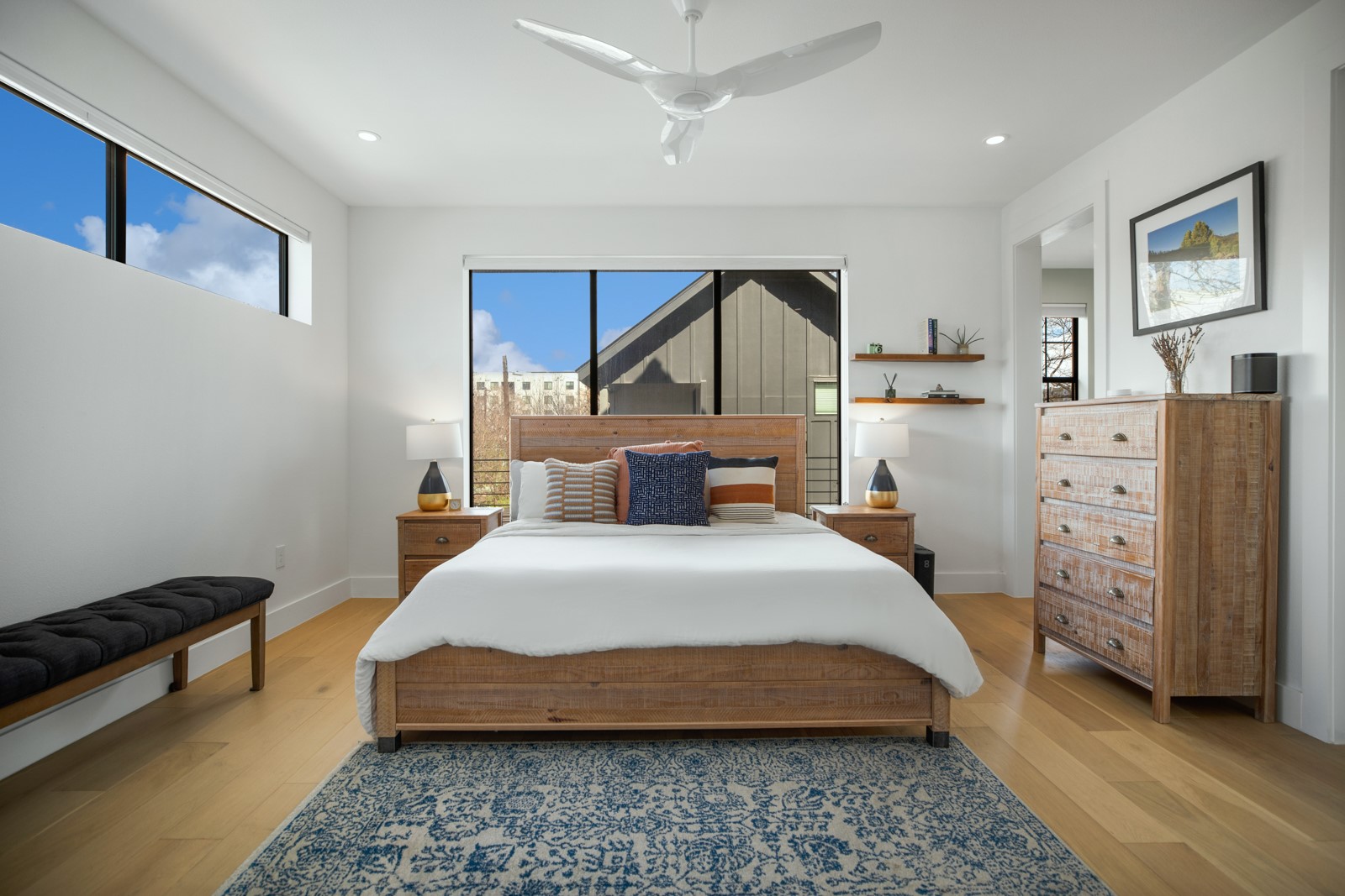 1410 East 3rd Street, Unit A Austin, TX 78702 - Photo 20 of 40 a bedroom with a bed and a dresser
