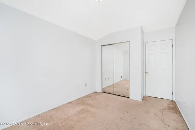 a bathroom with a bathtub and a toilet