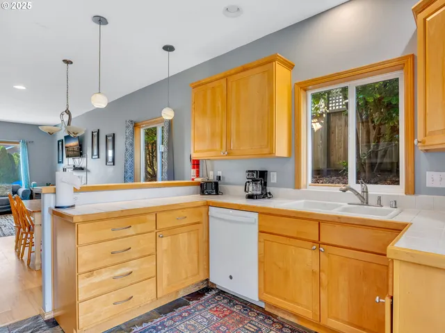 a view of a center island and windows