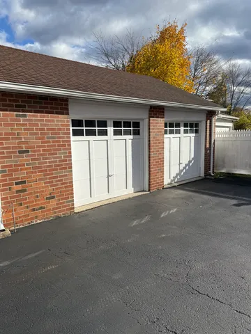 a view of a house with a garage