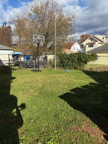 a view of a lake with a building in the background