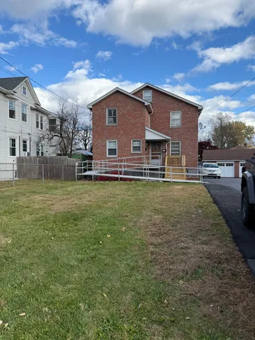 a house view with a outdoor space