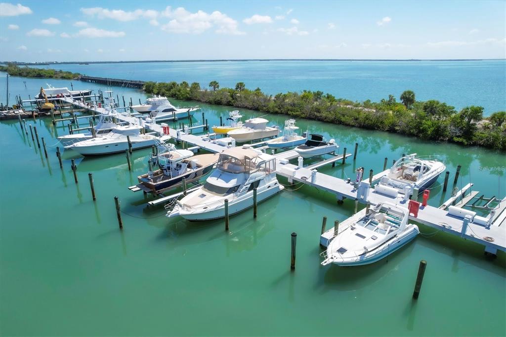 5820 Gasparilla Road, Unit SLIP #49 Boca Grande, FL 33921 - Photo 12 of 18 an aerial view of a house with outdoor space