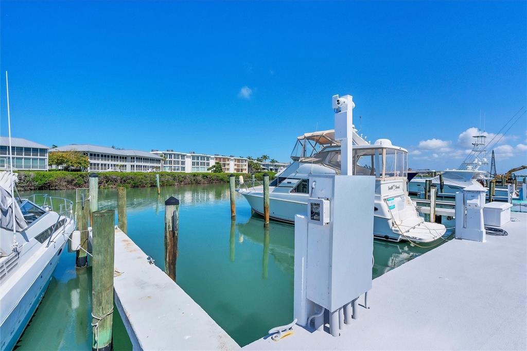 5820 Gasparilla Road, Unit SLIP #49 Boca Grande, FL 33921 - Photo 7 of 18 a view of a lake with sitting area