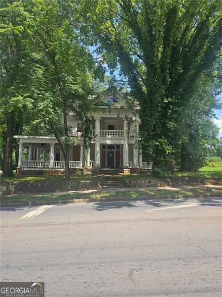 801 Maple Avenue Southwest Rome, GA 30161 - Photo 3 of 3 a view of a house with a yard
