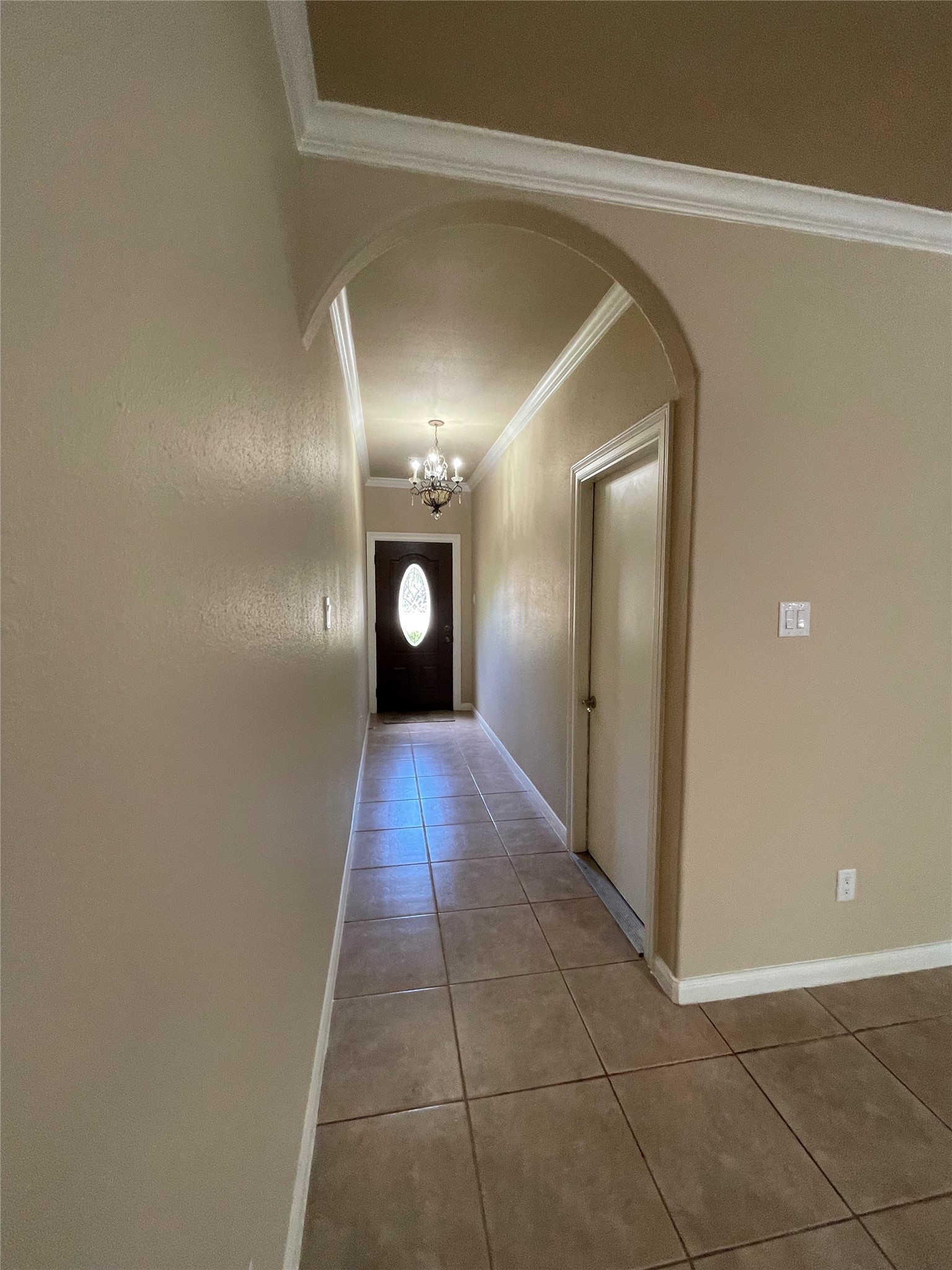 10607 Mills Way Houston, TX 77070 - Photo 16 of 17 a view of a hallway with wooden floor