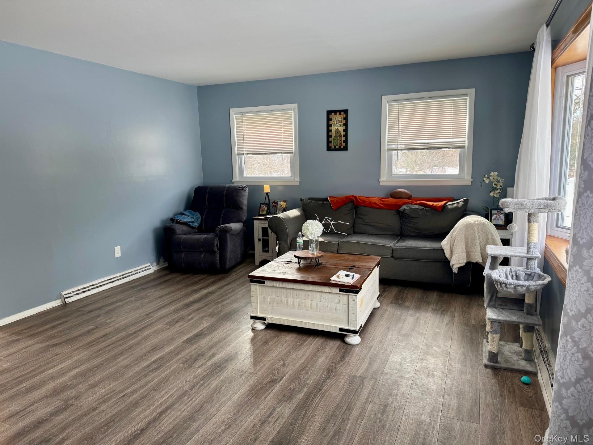 10 Maplewood Road Highland Mills, NY 10930 - Photo 3 of 9 a living room with furniture window and wooden floor
