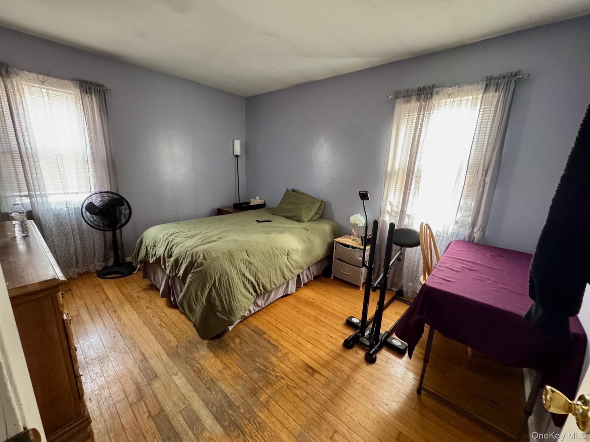 10 Maplewood Road Highland Mills, NY 10930 - Photo 4 of 9 a bedroom with two beds and a chair