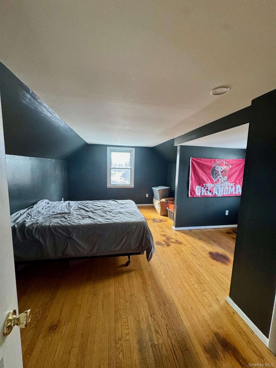 10 Maplewood Road Highland Mills, NY 10930 - Photo 8 of 9 a bedroom with a bed and a flat screen tv