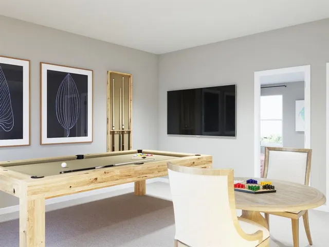 a bedroom with a bed a mirror and a large window