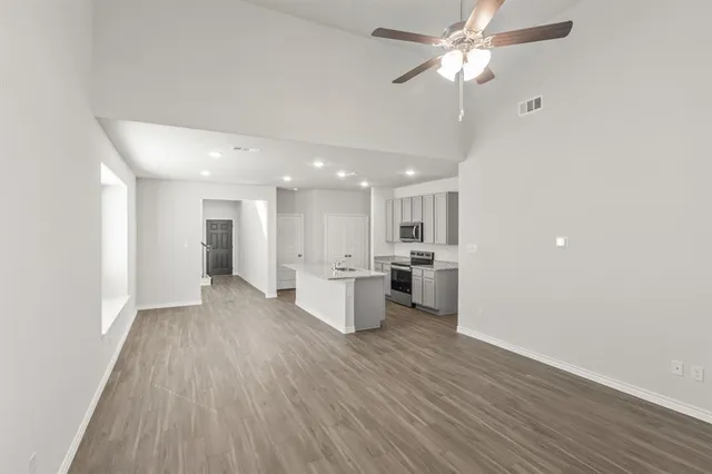 a view of kitchen with wooden floor
