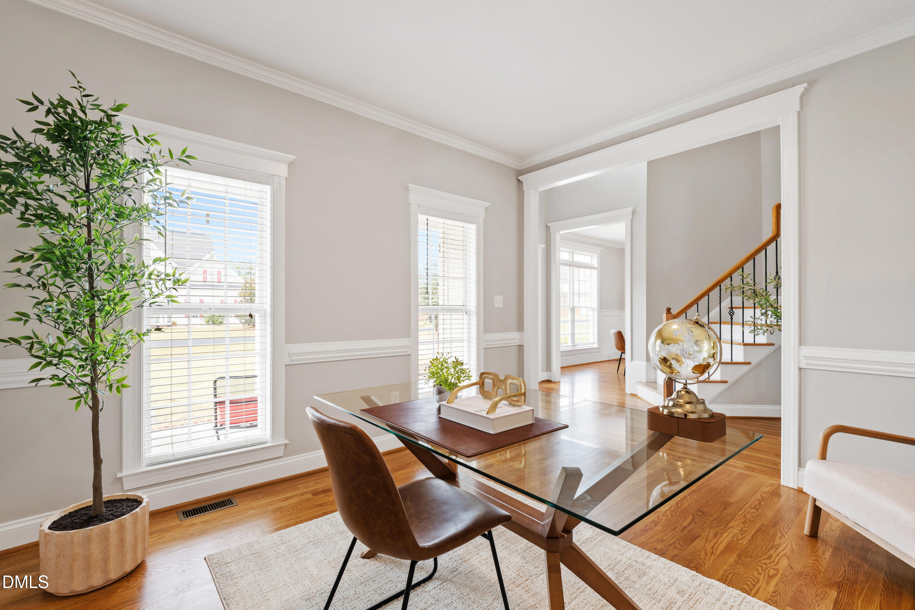 7753 Pegram Street Willow Spring, NC 27592 - Photo 11 of 54 a view of a livingroom with furniture window and wooden floor