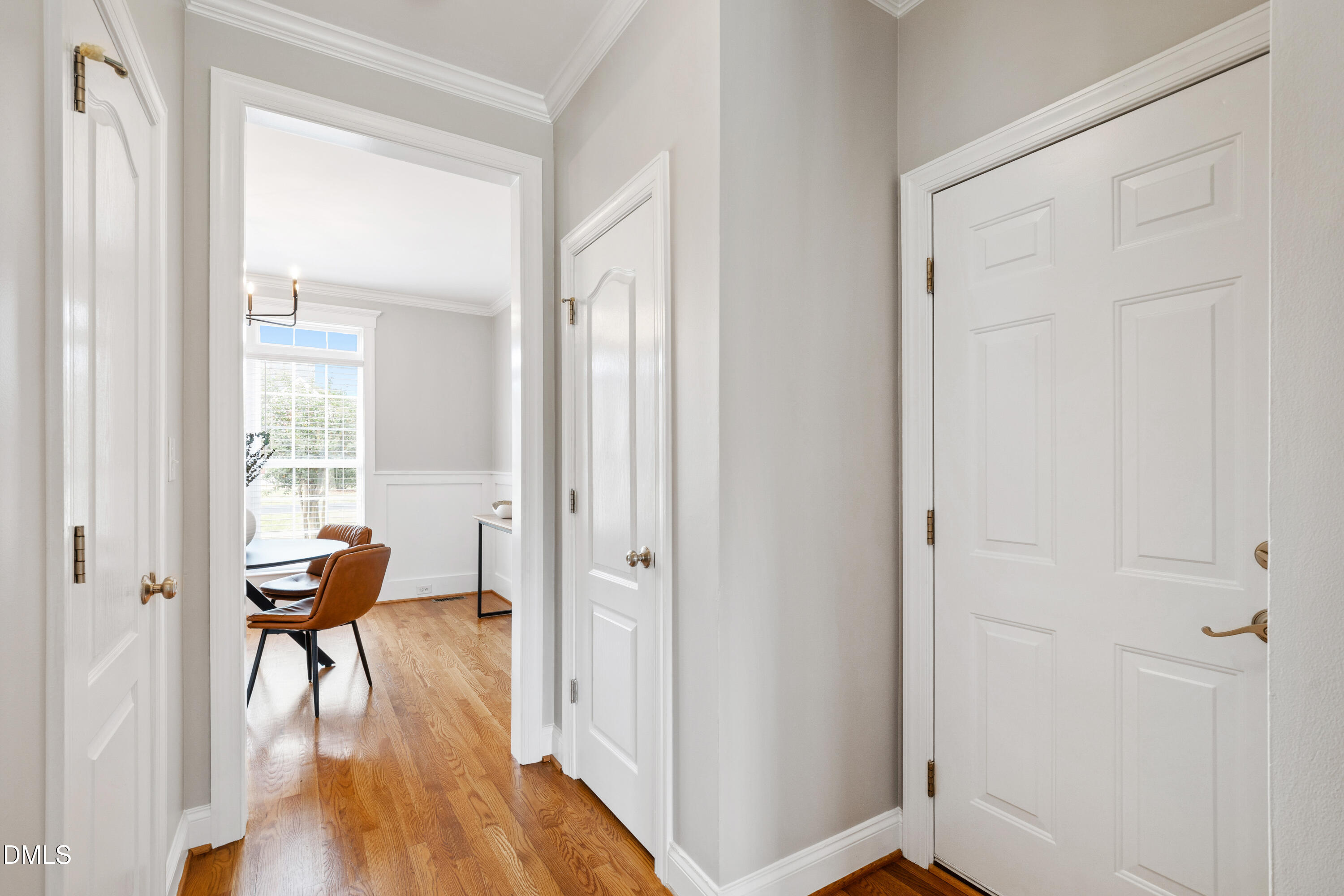 7753 Pegram Street Willow Spring, NC 27592 - Photo 13 of 54 a view of a room with wooden floor and furniture