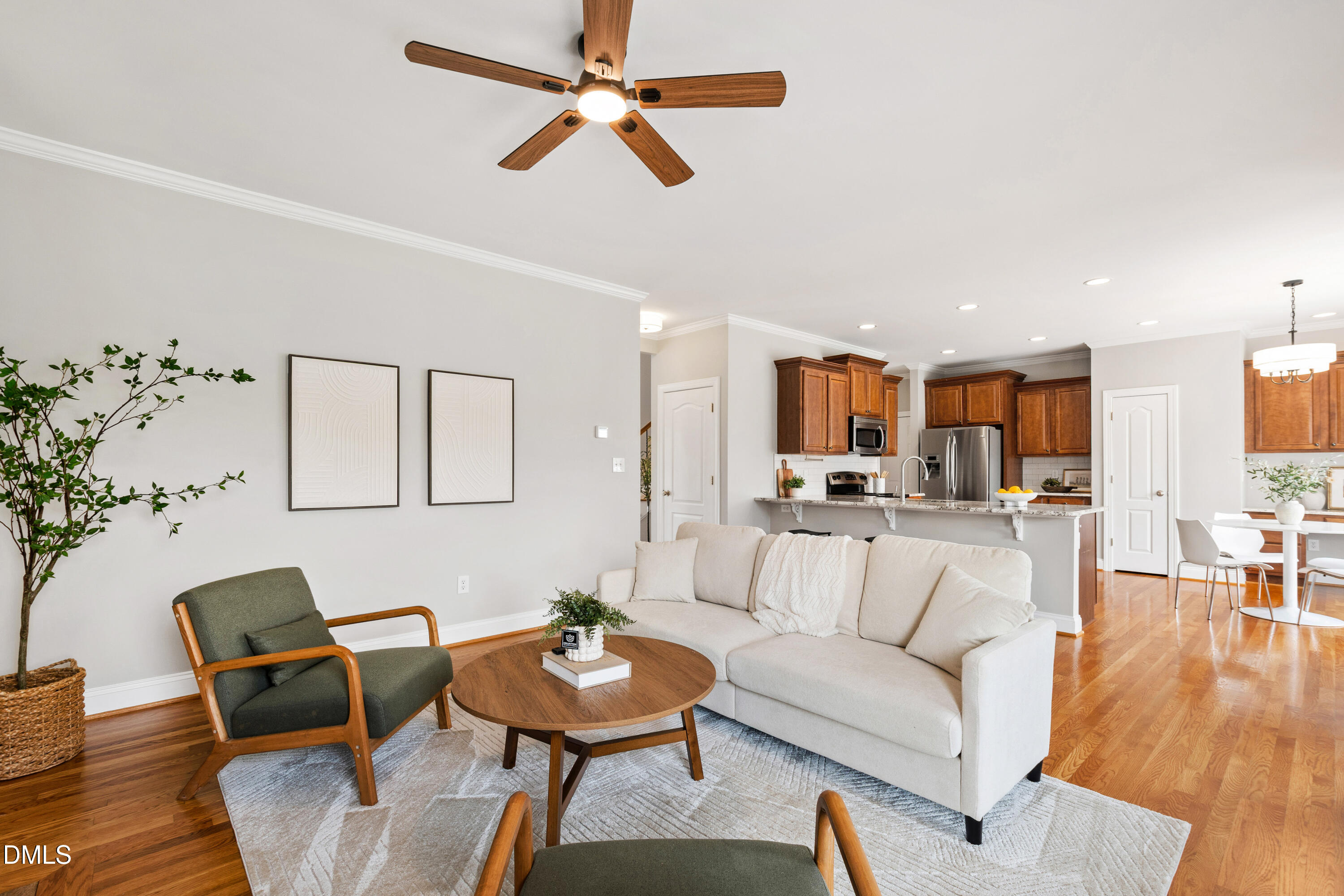7753 Pegram Street Willow Spring, NC 27592 - Photo 24 of 54 a living room with furniture and a view of kitchen
