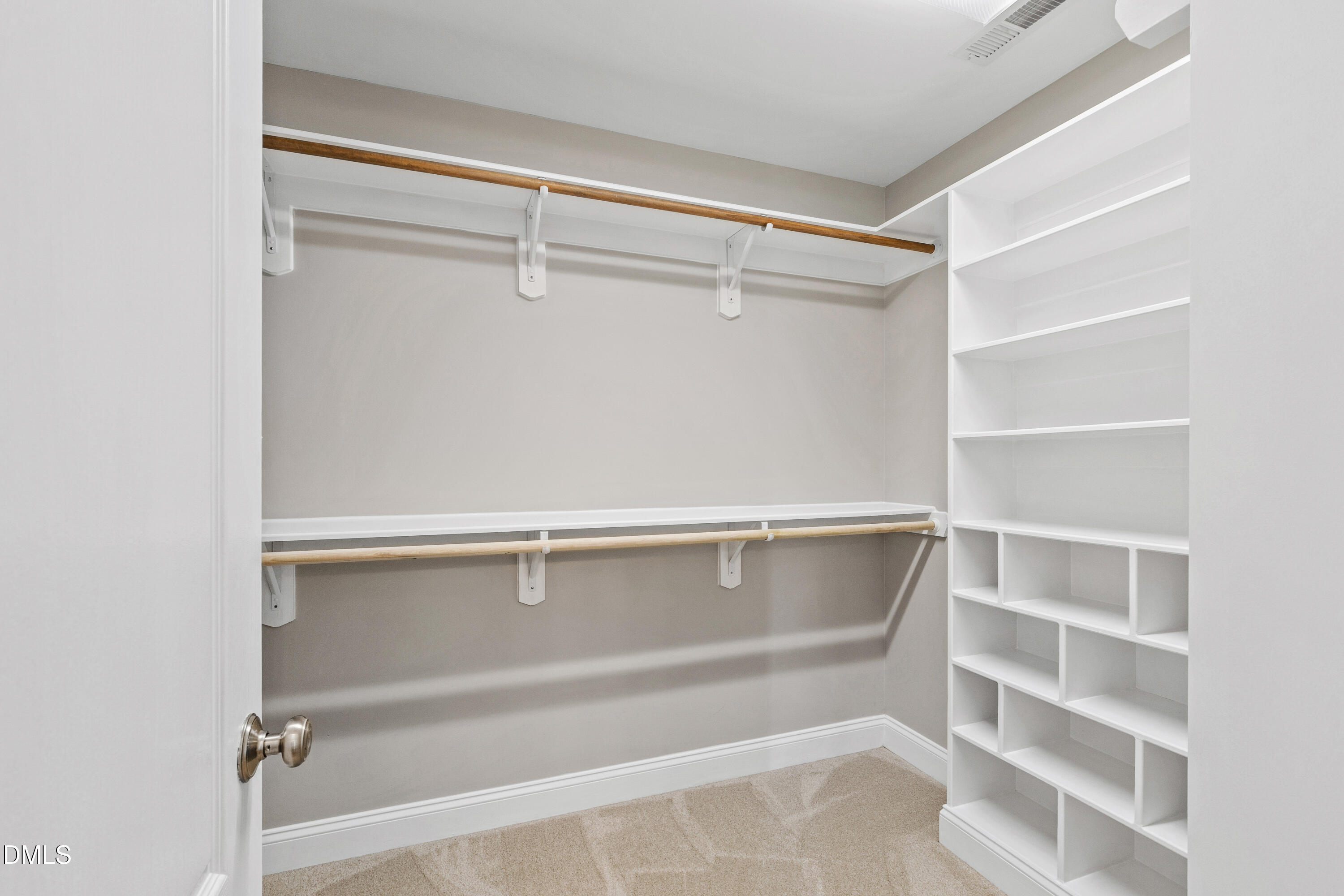 7753 Pegram Street Willow Spring, NC 27592 - Photo 34 of 54 a view of an empty walk in closet